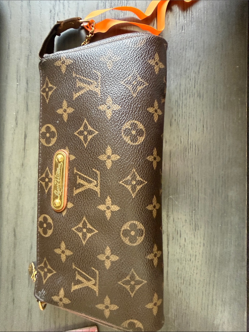 Authentic Louis Vuitton Monogram Eva with both wraps and COA